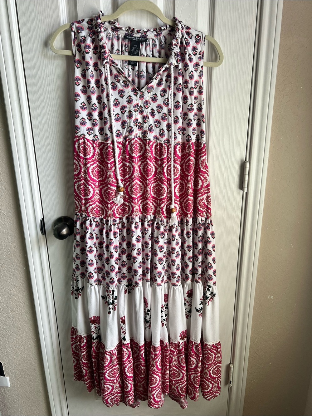 Chelsea & Theodore Sleeveless Tiered Maxi Dress